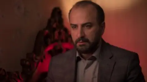Still 3 of The Seed of the Sacred Fig (2024) BluRay [Hindi (DD5.1) & Persian] 1080p 720p & 480p Dual Audio [x264/10Bit-HEVC]