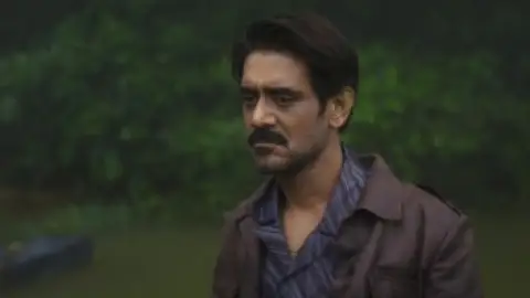 Still 6 of Eko (2025) WEB-DL [Hindi (DD5.1) & Malayalam] 4K 1080p 720p & 480p Dual Audio [x264/10Bit-HEVC]