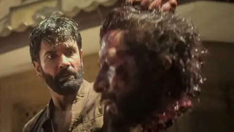 Still 4 of Dhurandhar: The Revenge (2026) V2 HQ-HDTC Hindi (ORG-UNCENSORED) 1080p 720p & 480p [x264/HEVC]